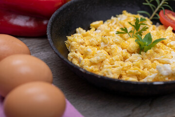 Scrambled eggs in metal pan