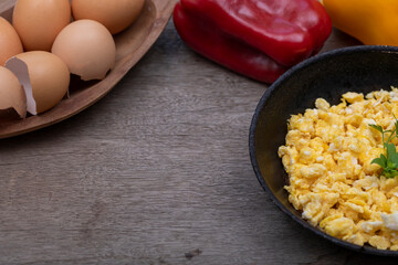 Scrambled eggs in metal pan