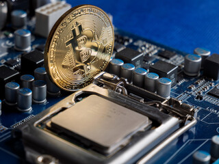 Bitcoin Cryptocurrency Coin on Circuit Board