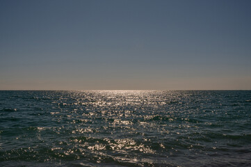 horizon. Sparkling sea water. Background for summer vacation concept.