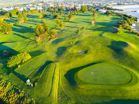 An aerial view of a lush green golf course