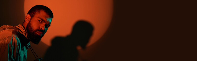 Captivating portrait of a handsome man in a summer evening glow