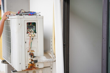 Technician service for repair and maintenance of air conditioners, Repairman fix air conditioning...