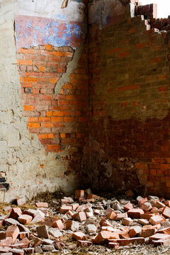 Broken wall and bricks of an old building