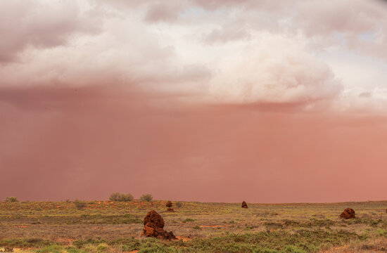 Dust storm form Cyclone Sean, above termite mounds in Pilbara
