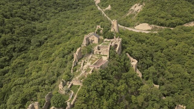 Aerial view Ujarma Fortress. Ancient Hilltop Royal Citadel and Strategic Stronghold of the Iberian Kings in Kakheti, Georgia. Sightseeing destination in Kakheti wine region