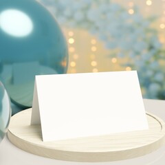 Template of white table card folded mockup with copy space. Place table card mockup for weddings birthday events. Decorative green Balloons and Blurred Background Lights. 3D rendering.