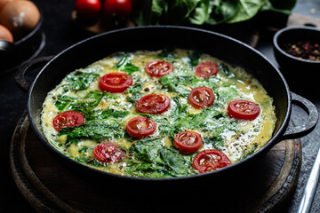 Delicious Homemade Spinach and Tomato Omelette in a Pan