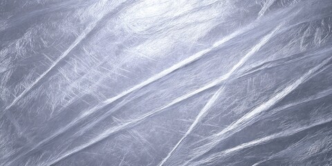 Cracked icy surface with subtle ridges and frosty texture in blue light
