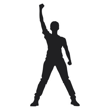 Silhouette of Man Raising Fist in Victory Pose