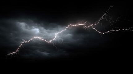 Fototapeta premium Lightning strikes illuminated by dark storm clouds during a thunderstorm at night in a dramatic display of nature's power