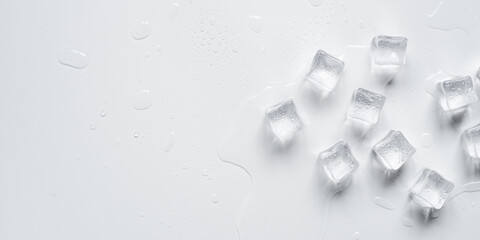 Melting ice cubes in a splash of water on a white background