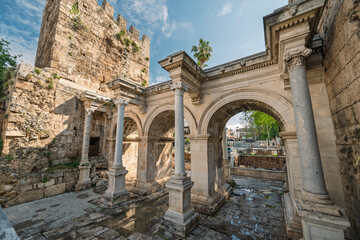 Fototapeta premium Hadrian Gate, also known as the Uc Kapilar, at the entrance to Antalya Old Town or Kaleici on a sunny day