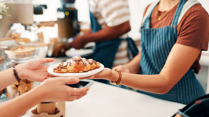 Cafe, croissant and hands of person with customer at counter for serving, help and purchase breakfast. Restaurant, hospitality and waiter with pastry, sweet treats and baked food for takeaway