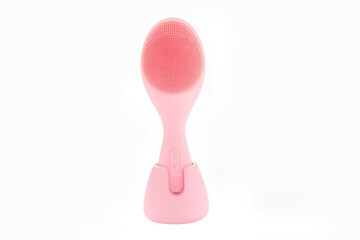 
Pink facial massager isolated on white background