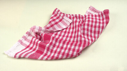 Clean sponge cloths with a checkered pattern isolated on white background. Household cleaning cloth. Closeup of cleaning rag isolated on a white background. Set of 5 sponge napkin isolated on a white.