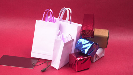 Gift box and bag made from craft paper the concept of handmade gift. Isolated background.