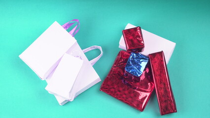 Gift box and bag made from craft paper the concept of handmade gift. Isolated background.
