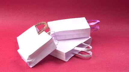 Gift box and bag made from craft paper the concept of handmade gift. Isolated background.
