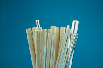 Straws of various materials in the cup