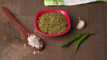 Coconut chutney in a bowl with raw coconut and green chilli ,Served with dosa, idli, vada
