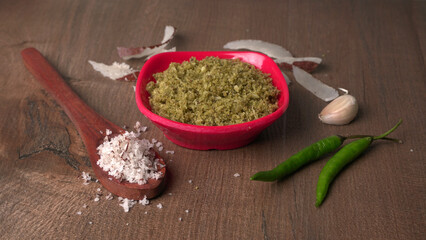 Coconut chutney in a bowl with raw coconut and green chilli ,Served with dosa, idli, vada
