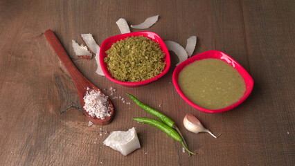 Coconut chutney in a bowl with raw coconut and green chilli ,Served with dosa, idli, vada
