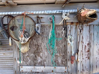 Fishing supplies and decor at trabucco, traditional wooden structure used for fishing in Southern Italy. Peschici, Puglia, Italy.