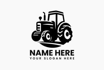 Classic black silhouette of vintage farm tractor with large rear wheels isolated on white background. Agriculture equipment concept