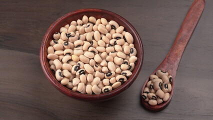 Uncooked black eyed peas. Health food concept.