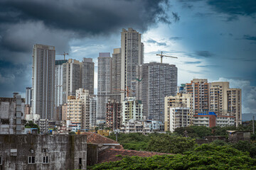 Cinematic view of Mumbai city at night. Mumbai's iconic financial district with this stunning cityscape view. Shot of Mumbai Skyline, high-rise buildings at South Mumbai, Maharashtra India.