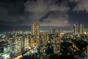 Cinematic view of Mumbai city at night. Mumbai's iconic financial district with this stunning cityscape view. Shot of Mumbai Skyline, high-rise buildings at South Mumbai, Maharashtra India.