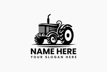 Simple black and white silhouette of a vintage tractor with large wheels on a clean white background. Agriculture concept