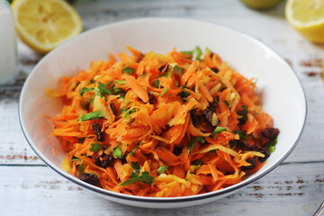 A bowl with traditional Polish carrot salad  © nastyakamysheva