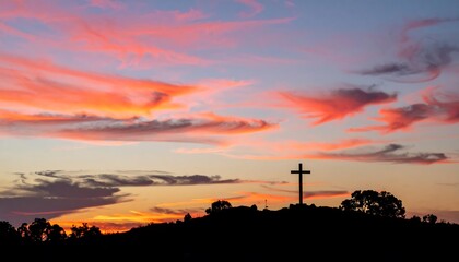 Sunset Silhouette of a Cross on a Hilltop