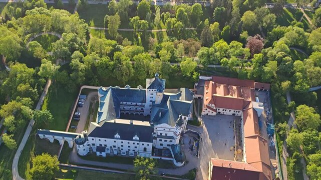 Pardubice castle on a hill with city center in background, beautiful aerial panorama capturing urban and historic landscape.