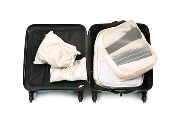 Open suitcase with packing cubes isolated on white, top view