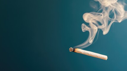 Burning cigarette with smoke