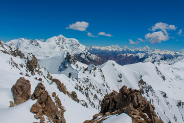 Tian Shan mountains glacier and snow summits on a sunny day with blue sky. Kyrgyzstan mountains on...
