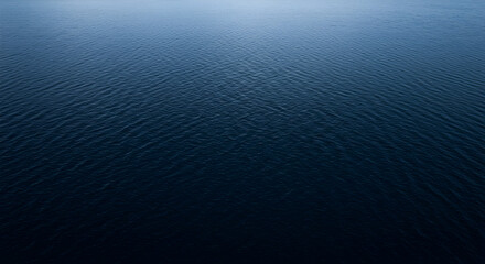 Obraz premium Abstract View Of Dark Blue Water Surface With Light Reflections And Textured Pattern