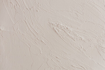 Textured white wall surface with subtle imperfections and smooth patterns