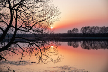 Naklejka premium sunset on the river