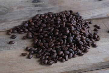 Coffee beans on a wooden background