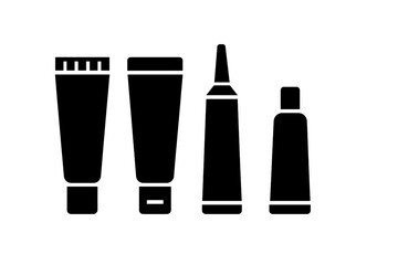 Various tubes of cream placed side by side showcasing different shapes and sizes in a minimalist setting