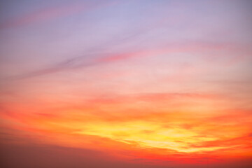 Obraz premium Beautiful , luxury soft gradient orange gold clouds and sunlight on the blue sky perfect for the background, take in evening,Twilight, Large size, high definition landscape photo