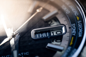 Watch,luxury automatic watch showing the day and date, with city names for world time. Perfect for concepts of precision, time management, and global connectivity, time zone,