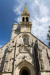 Fototapeta premium Notre Dame de Confort Church standing tall in Confort Meilars, Brittany, France