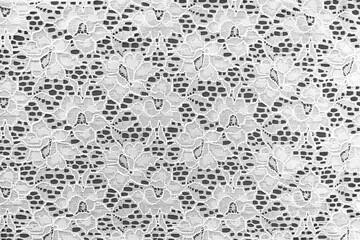 
background gray floral lace. openwork embroidery with flowers