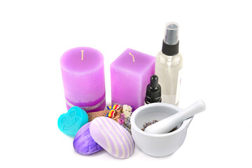 Lavender flowers, scented candle, oil, lotion and soap isolated on white.