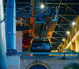 the cabin leaves the cable car parking lot, climbing up the cables. The technical elements are...
